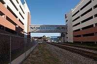  New parking structures on both sides of the tracks at the station location