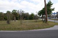  Vacant land and commercial buildings north of station location