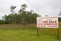  Sign on land west of Orange Avenue across from station location